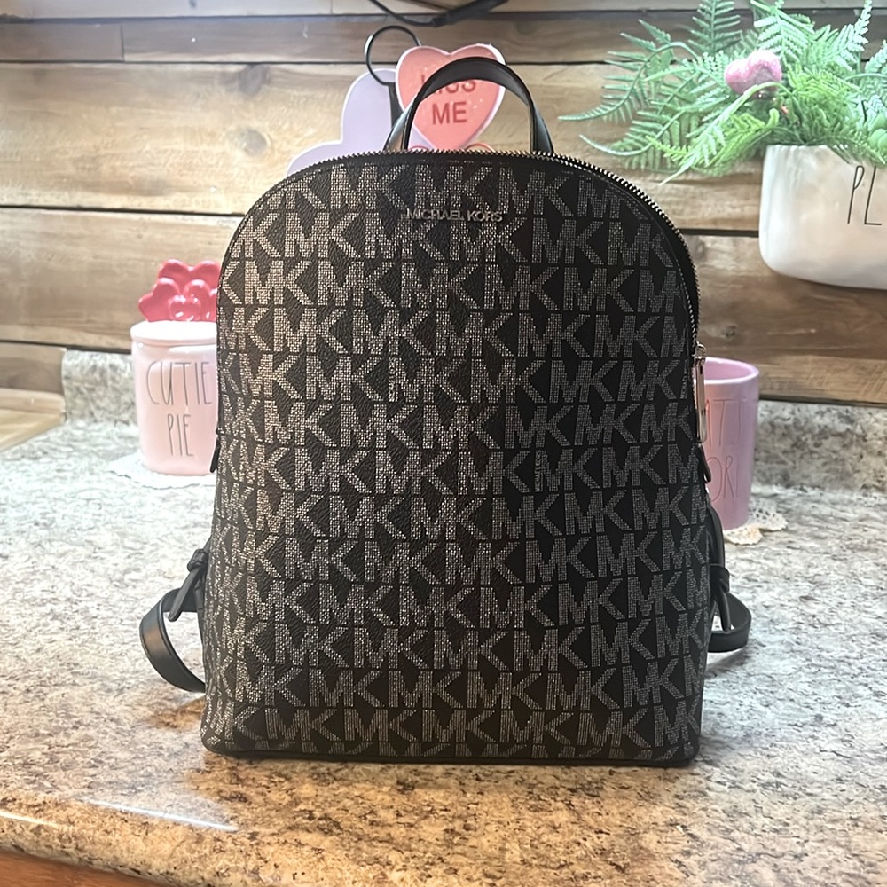 Only used a few times perfect condition authentic MK backpack